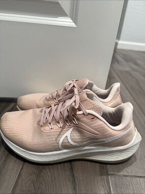 Nike Women's Light Pink Running Sneakers with White Swoosh